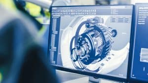 At the Factory: Female Mechanical Engineer Designs 3D Engine on